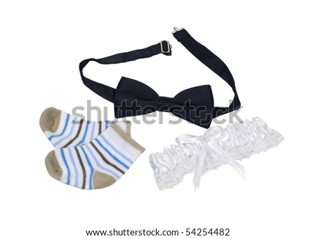 Marriage and children shown by baby socks with a bow tie and a lace garter belt