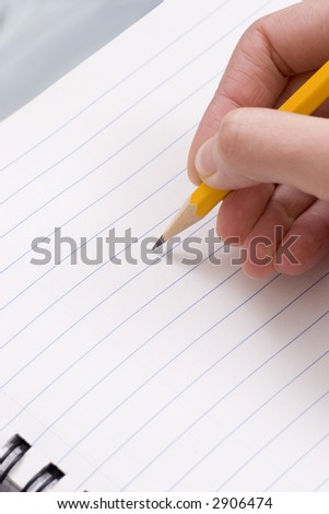 Pencil in hand, clean note pad page
