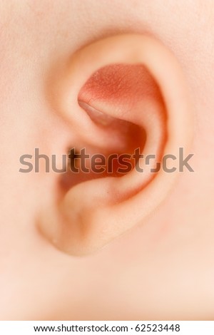 close-up on one month old baby\'s ear