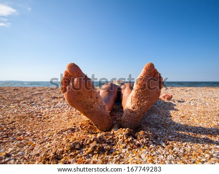 funny feet on warm summer  beach