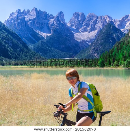 Mountain biking - woman on bike, Dolomites, Italy