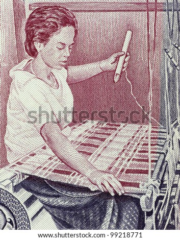 CAMBODIA - CIRCA 1973: Carpet Weaving on 100 Riels 1973 Banknote from Cambodia.