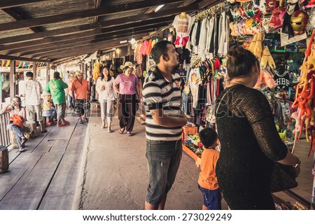 Phra Nakhon Si Ayutthaya, Thailand - April 14, 2015: Ayothaya Floating Market. Has a many visitors, both Thais and foreign visitors with varieties of Thai clothes and Thai food at Ayutthaya,Thailand