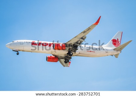 BANGKOK, THAILAND - JUNE 1, 2015: HS-LTI Thai Lion Air Boeing 737-900 landing to Don Mueang International Airport Thailand. Thai Lion Air company is the largest low cost airlines in Asia.