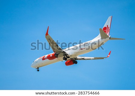 BANGKOK, THAILAND - JUNE 1, 2015: HS-LTR Thai Lion Air Boeing 737-900 landing to Don Mueang International Airport Thailand. Thai Lion Air company is the largest low cost airlines in Asia.