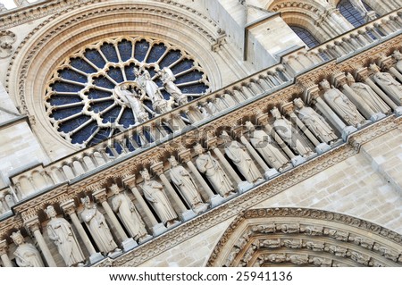 The western facade and West Rose Window of the Gothic cathedral Notre Dame de Paris in Paris, France.