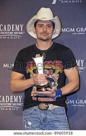 LAS VEGAS - APRIL 3 - Brad Paisley with the award for Top Male Vocalist in the press room at the 46th Annual Academy of Country Music Awards in Las Vegas, Nevada on April 3, 2011.