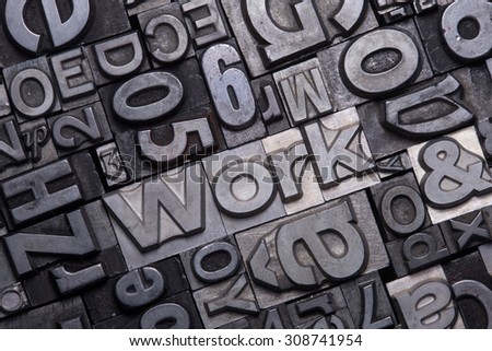 lead type letters form the word work