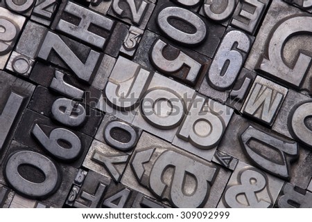 lead type letters form the word job