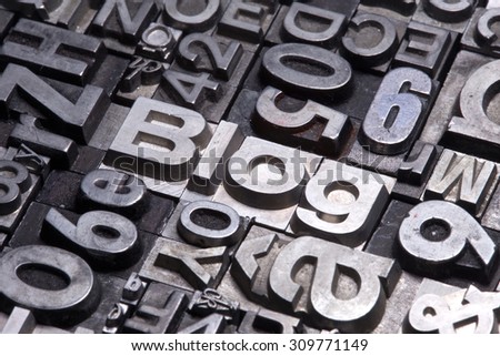 lead type letters form the word blog