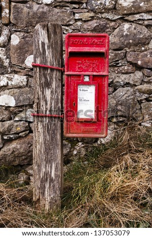 KIRKBARROW, ENGLAND - APRIL 01:  A traditional red English letterbox in the village of Kirkbarrow, near Tirril in the English Lake District national park pictured on April 01, 2013.