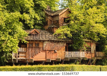 ALNWICK, ENGLAND - JULY 14: Alnwick Garden tree house in Northumberland, Northern England is pictured on July 14, 2013.  The tree house opened in 2004 and is one of the largest in the world.