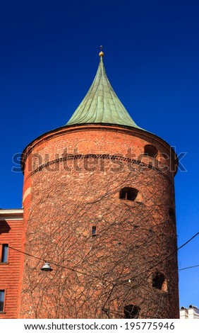 The Powder Tower.  The Powder Tower in Riga, capital of Latvia, dates back to the 14th century and was originally part of the defensive fortress surrounding the old town.