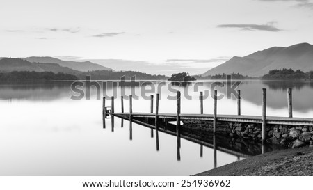 Derwentwater Landing Stage.  A black and white image of Ashness Gate landing stage.  The landing stage is on the banks of Derwentwater, Cumbria in the English Lake District national park.