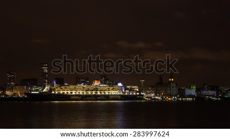 LIVERPOOL, ENGLAND - MAY 24:  Cunard cruise liner Queen Mary 2 docked in Liverpool and pictured in the evening of May 24, 2015 as part of celebrations to mark Cunard\'s 175th anniversary.