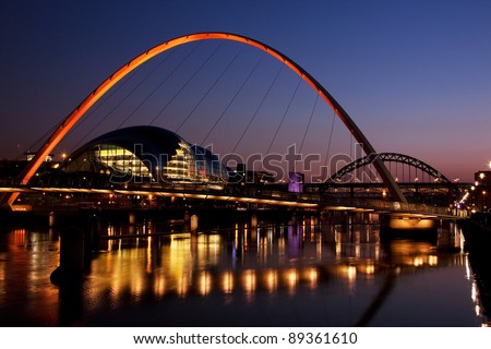 Gateshead Evening.  The image shows the Gateshead Millennium Bridge in the foreground with the Sage and the Tyne Bridge in the background.