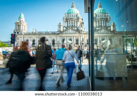 Motion blurred people on Belfast high street 