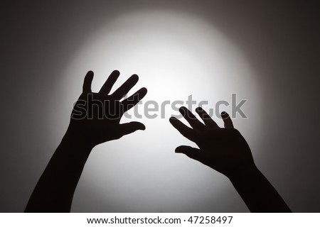 Silhouette of woman hands
