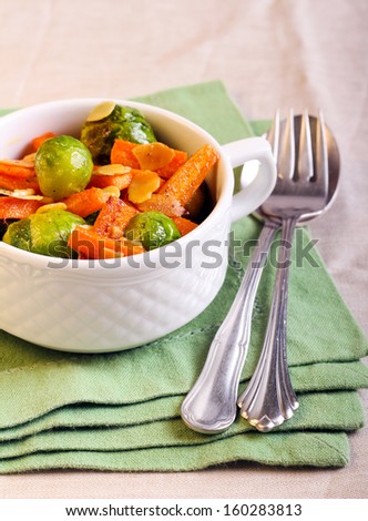 Fried brussels sprout, carrot and almond