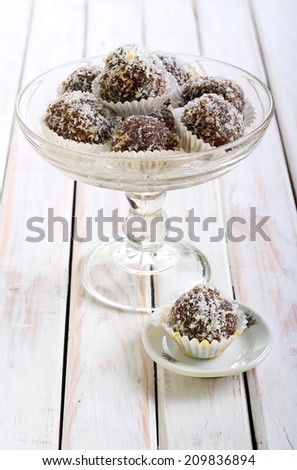Homemade sweet balls coated with shredded coconut