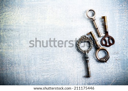 Vintage keys over painted surface