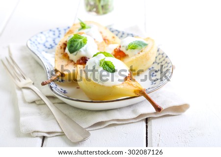Baked pears with marmalade and minted yogurt