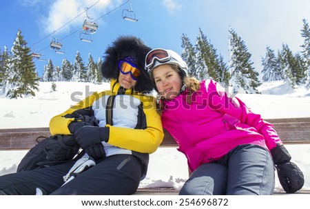 Mother and daughter on the ski vacation