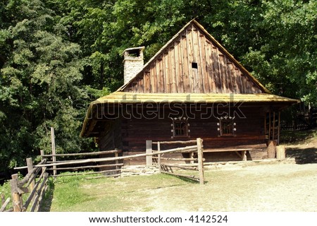 An old historic houses in museum – Roznov Skansen - Wallachian Village open air museum- in Czech republic in Europe under mountains by name Beskydy