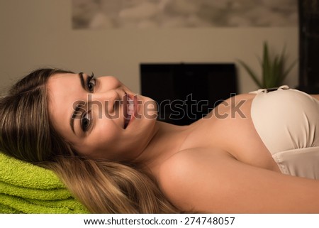 Woman relaxing in spa beauty center - Soft light