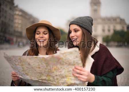 Similar – Image, Stock Photo two women sightseeing Porto views by the river and taking picture with mobile phone. Travel and friendship concept