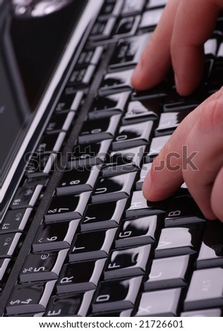 Male hands on laptop