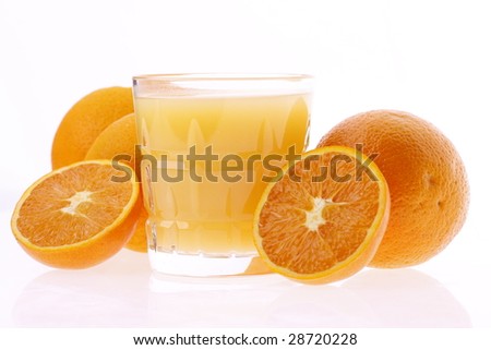 Orange drink and oranges