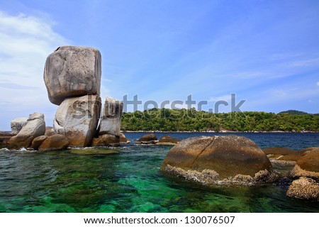Stack of natural big stone arch against blue sky at Andaman sea near Lipe island, Thailand
