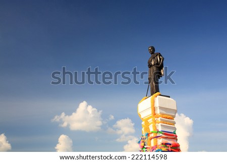 Thao Suranaree or Khun Ying Mo, wife of King Rama III who save the city from  invasion of the Laotian army, statue against blue sky at Korat, Thailand.