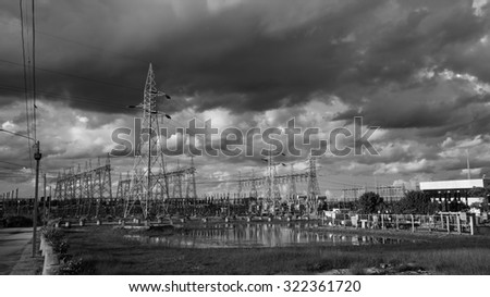 Electric power substation against dramatic sky and cloud, Black and white