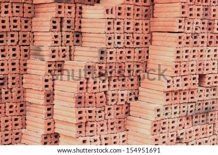 bricks used in the construction are made of earth, water, fire and burned up with the heat