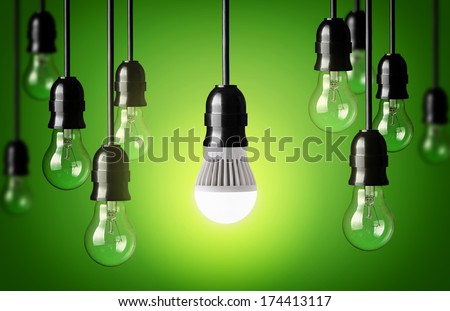 LED bulb and simple light bulbs.Green background