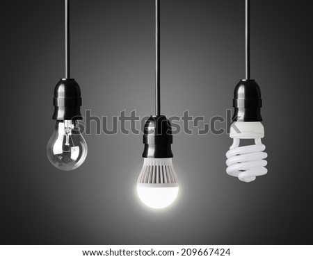 Light bulb,energy saver bulb and LED bulb on black