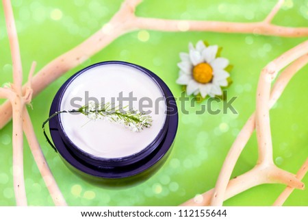 concept of organic cosmetics, beauty product with bokeh overlay