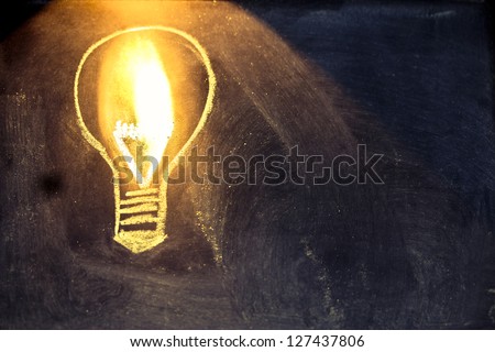 lighbulb design on blackboard, metaphor of innovation Photo stock © 