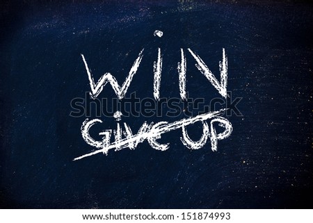 winners never give up, writing on blackboard