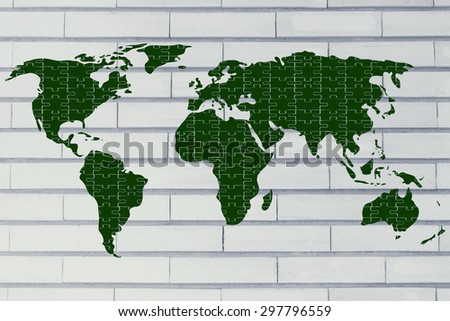 the pieces of a jigsaw puzzle composing the map of the world, concept of globalization