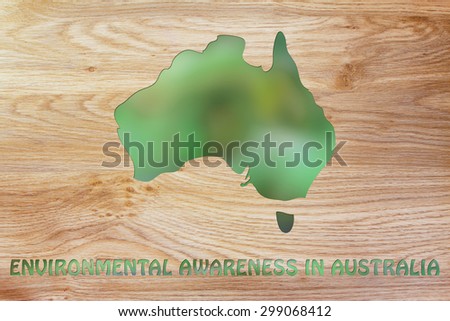 environmental awareness throughout the world: illustration with map of australia made of green leaves blur