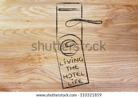 hotel room lock with door hanger saying Living the Hotel Life