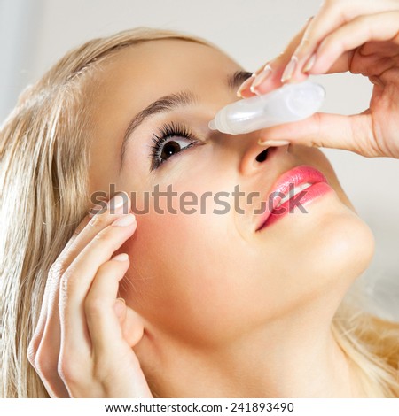 Woman dripping eyes