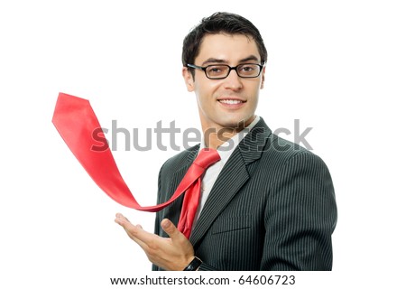 Happy smiling successful businessman with raised red tie, isolated on white background