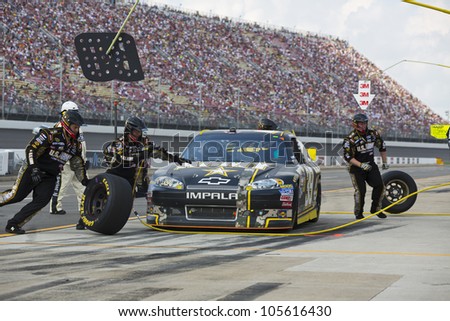BROOKLYN, MI - JUN 17, 2012:  Ryan Newman (39) brings in his US Army Chevrolet for service during the Quicken Loans 400 at the Michigan International Speedway in Brooklyn, MI on June 17, 2012.