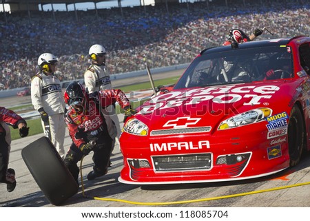 FORT WORTH, TX - NOV 04:  Tony Stewart (14) brings in his car for a pit stop during the AAA Texas 500 at Texas Motor Speedway in Fort Worth, TX on Nov 4, 2012.