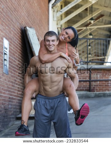 Fitness couple posing in an outdoor environment