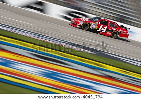 FT. WORTH, TX - NOV. 6:Tony Stewart brings his Office Depot Chevrolet through the frontstretch during a practice session for the Dickies 500 race in Ft. Worth, TX on Nov. 6, 2009.